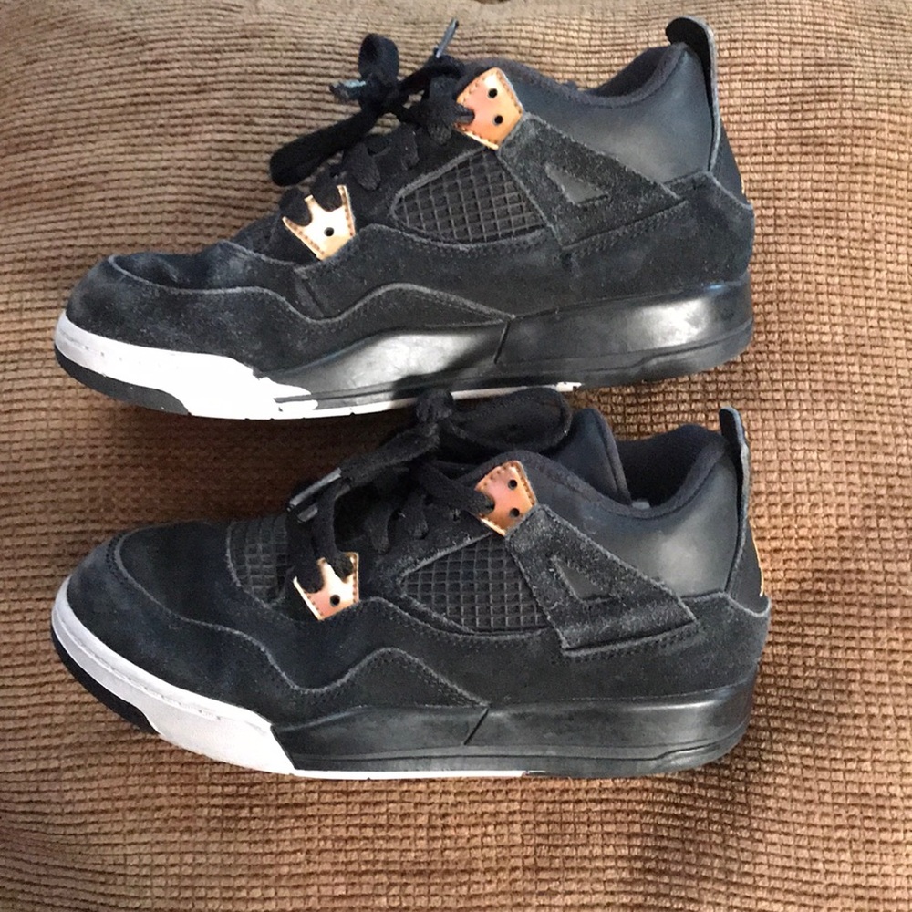 Jordans size 3youth black with little bits of gold